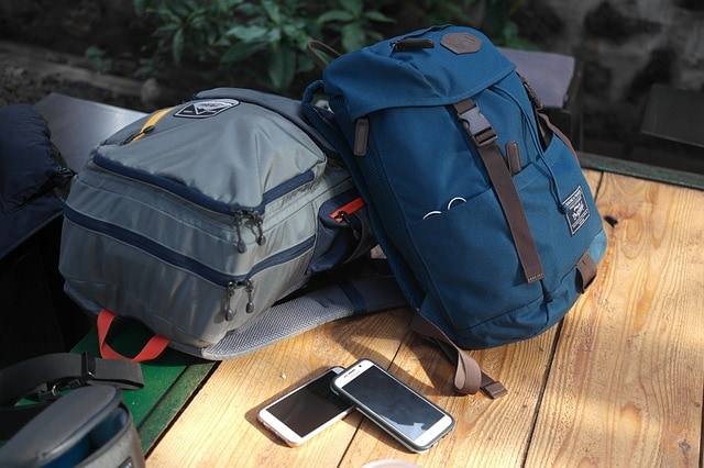 pack for a hike two backpacks on a table